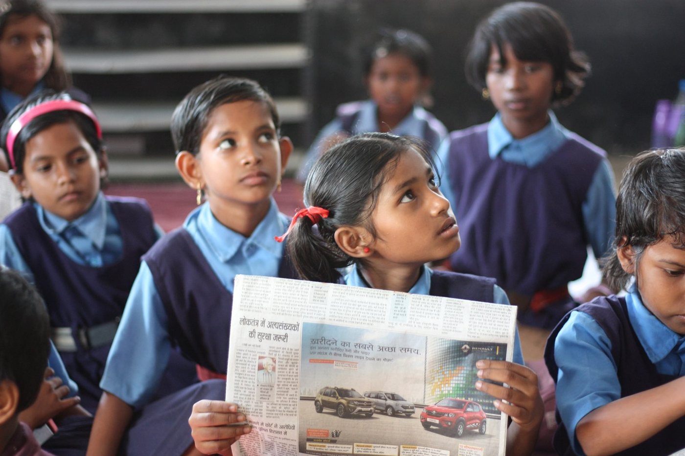 Santosh Talaghatti with schoolgirls during a Namaskar with Love Foundation classroom session